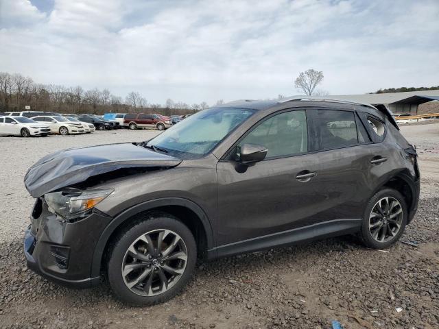 MAZDA CX-5 GT 2016 with VIN JM3KE4DY6G0739747 - Photo from auction