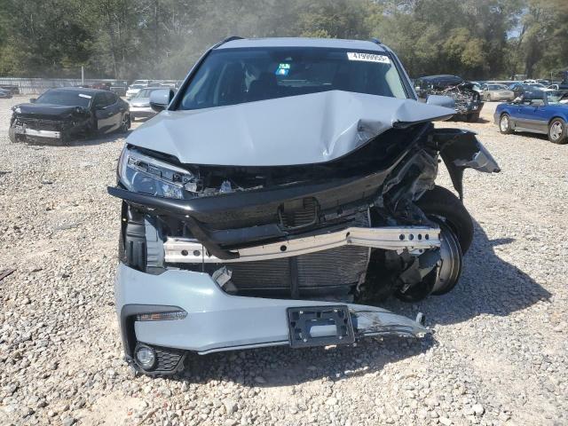 Photo 5 from auction – 2022 HONDA PILOT SE with VIN 5FNYF6H20NB100179