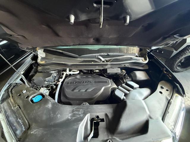 Photo 7 from auction – 2023 HONDA RIDGELINE with VIN 5FPYK3F54PB034057