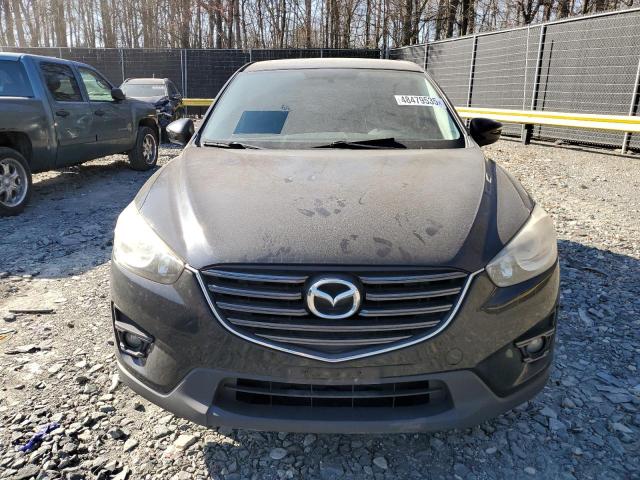 Photo 5 from auction – 2016 MAZDA CX-5 TOURI with VIN JM3KE2CY2G0713586