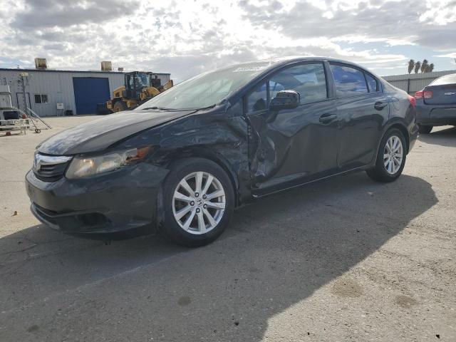 HONDA CIVIC 2012 with VIN 19XFB2F8XCE390128 - Photo from auction