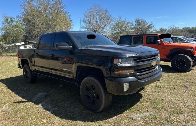 CHEVROLET SILVERADO 2016 with VIN 3GCUKREC8GG303584 - Photo from auction