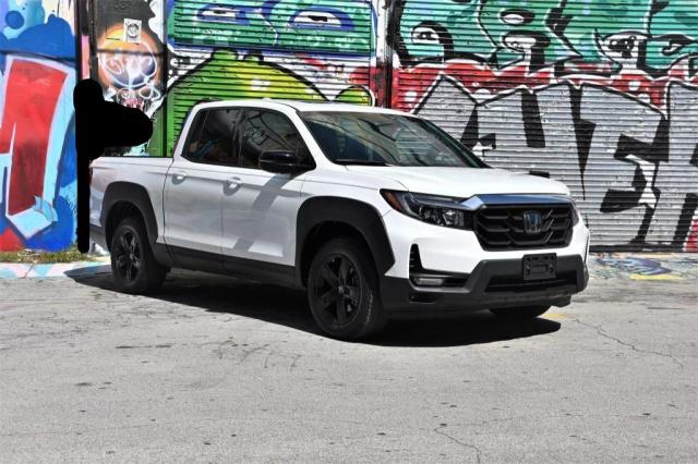 HONDA RIDGELINE 2023 with VIN 5FPYK3F87PB036086 - Photo from auction