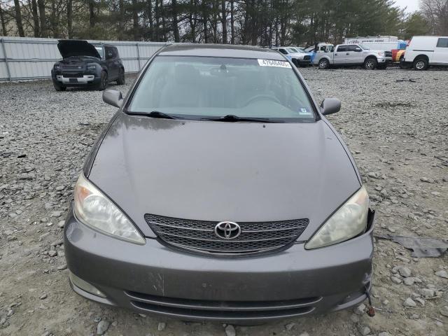 Photo 5 from auction – 2004 TOYOTA CAMRY LE with VIN 4T1BE30K14U918475