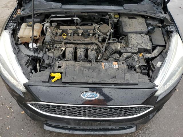Photo 11 from auction – 2015 FORD FOCUS SE with VIN 1FADP3F25FL306115