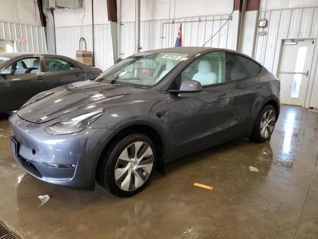 TESLA MODEL Y 2023 con VIN 7SAYGAEE9PF980013 - Foto de la subasta