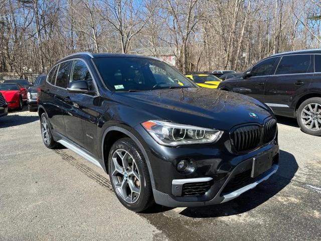 BMW X1 XDRIVE2 2017 with VIN WBXHT3C32H5F67896 - Photo from auction