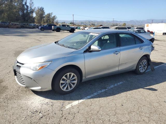 TOYOTA CAMRY LE 2016 with VIN 4T4BF1FK0GR557825 - Photo from auction