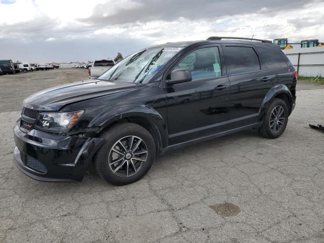 DODGE JOURNEY SE 2018 with VIN 3C4PDCABXJT243436 - Photo from auction
