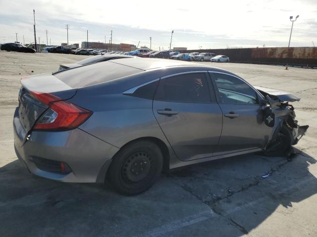 Photo 3 from auction – 2018 HONDA CIVIC LX with VIN 2HGFC2E55JH554120