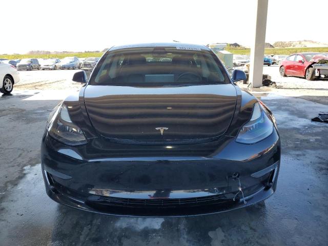 Photo 5 from auction – 2022 TESLA MODEL 3 with VIN 5YJ3E1EB9NF231728