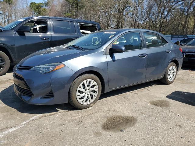 TOYOTA COROLLA L 2017 with VIN 5YFBURHE2HP694760 - Photo from auction