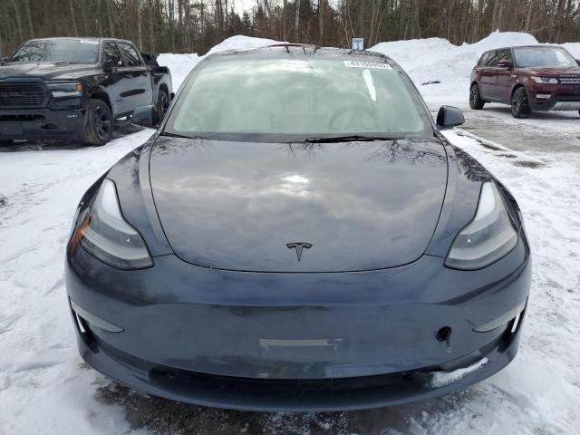 Photo 5 from auction – 2022 TESLA MODEL 3 with VIN 5YJ3E1EA9NF319198