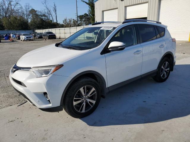TOYOTA RAV4 XLE 2017 with VIN JTMRFREV7HJ125890 - Photo from auction
