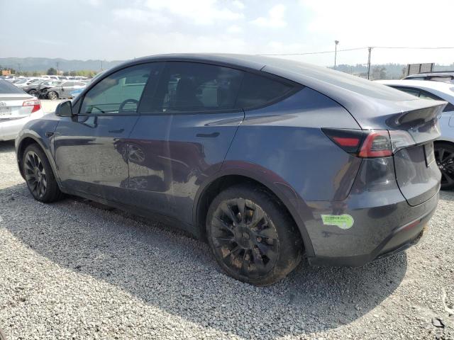 Снимка 2 от търг – 2023 TESLA MODEL Y с VIN 7SAYGDEE9PF624212