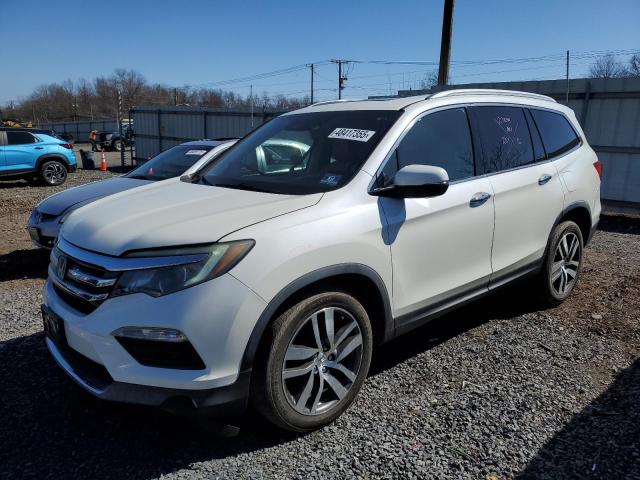 HONDA PILOT TOUR 2016 with VIN 5FNYF6H97GB040191 - Photo from auction