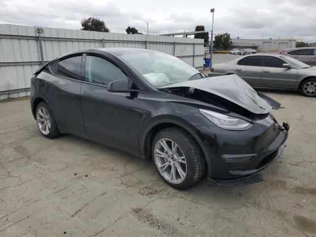 Photo 4 from auction – 2022 TESLA MODEL Y with VIN 7SAYGDEEXNF348524