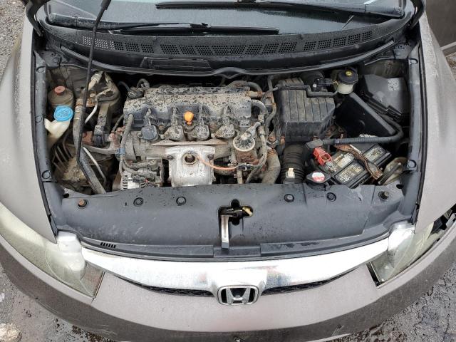 Photo 11 from auction – 2011 HONDA CIVIC LX-S with VIN 2HGFA1F60BH009290