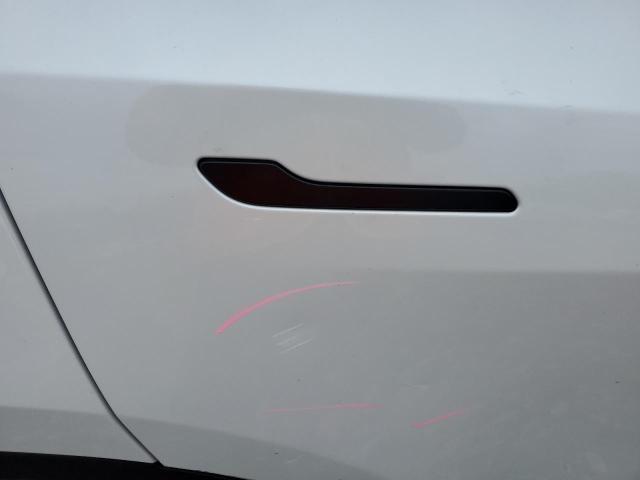 Photo 11 from auction – 2023 TESLA MODEL Y with VIN 7SAYGDEE5PA073077