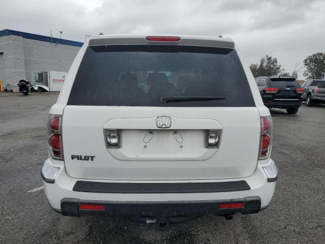 Снимка 6 от търг – 2006 HONDA PILOT EX с VIN 5FNYF28556B026374