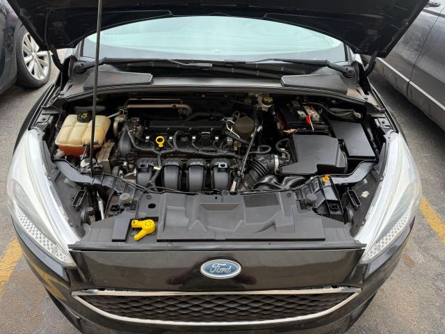 Снимка 7 от търг – 2016 FORD FOCUS SE с VIN 1FADP3F23GL230086
