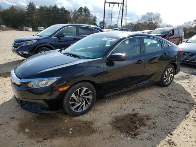 HONDA CIVIC EX 2017 with VIN 2HGFC2F78HH556423 - Photo from auction