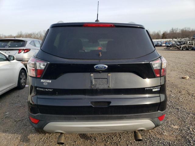 Photo 6 from auction – 2017 FORD ESCAPE TIT with VIN 1FMCU9J98HUA02131