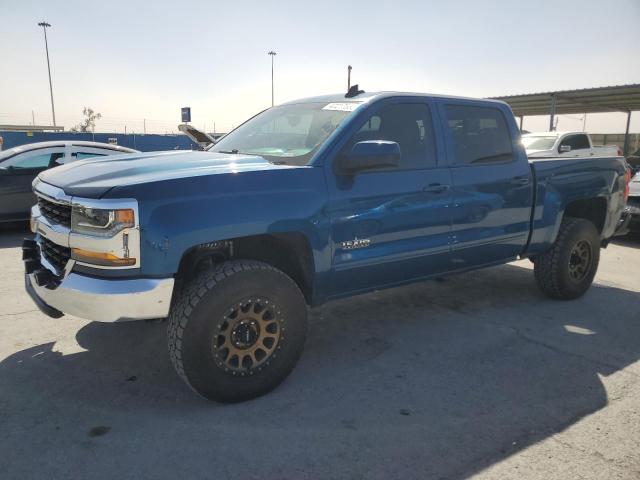 CHEVROLET SILVERADO 2018 with VIN 3GCUKREC4JG139998 - Photo from auction