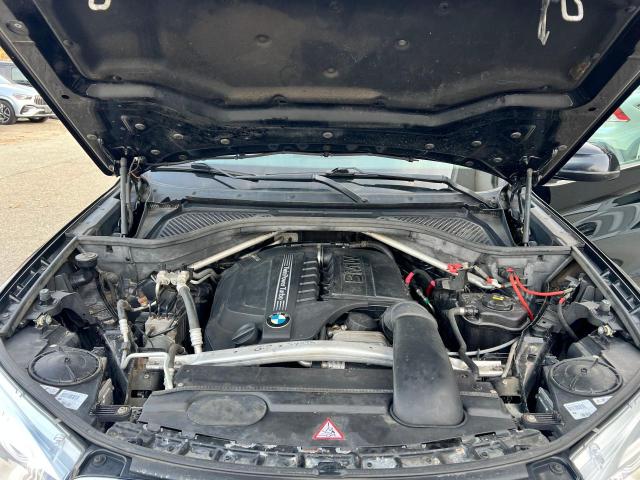 Photo 7 from auction – 2015 BMW X5 XDRIVE4 with VIN 5UXKR0C56F0P07620