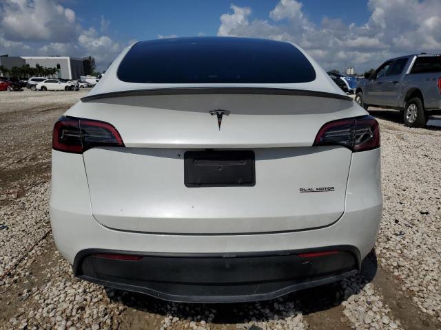 Photo 6 from auction – 2023 TESLA MODEL Y with VIN 7SAYGDEF0PF832570