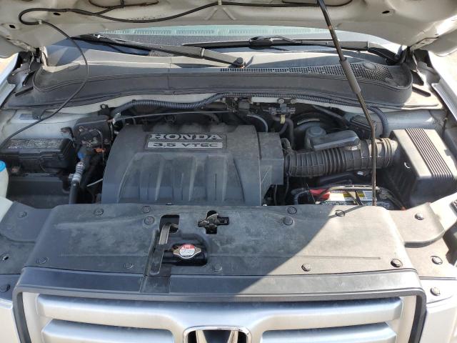 Photo 12 from auction – 2006 HONDA PILOT EX with VIN 2HKYF18426H552836