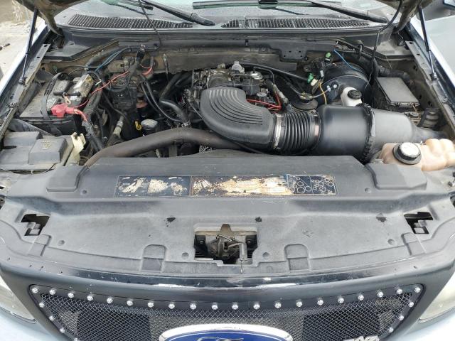 Снимка 11 от търг – 2003 FORD F150 SUPER с VIN 1FTRW07603KC83489