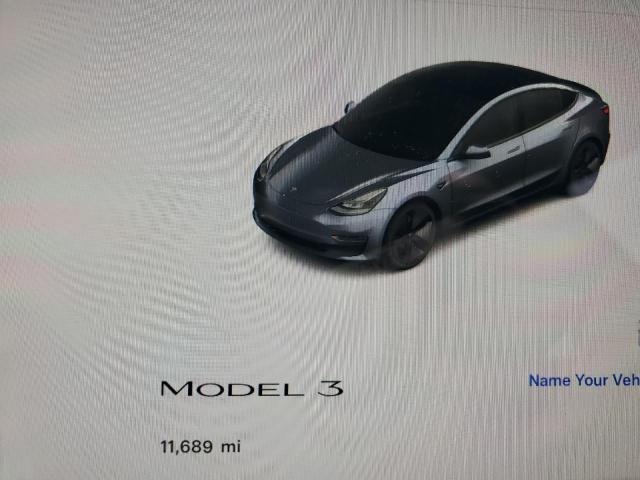Photo 9 from auction – 2023 TESLA MODEL 3 with VIN 5YJ3E1EA7PF700745