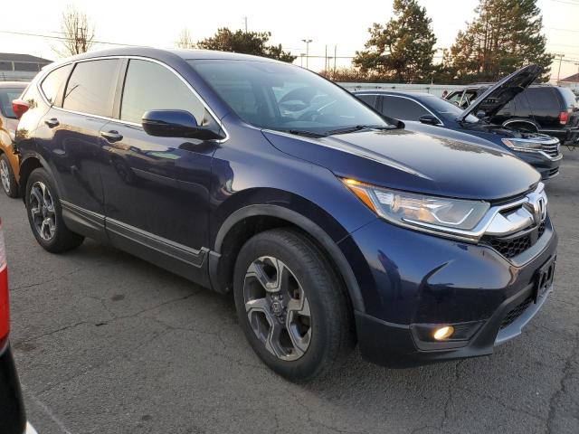 Photo 4 from auction – 2018 HONDA CR-V EX with VIN 7FARW2H59JE003231
