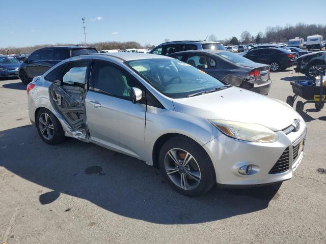 Photo 4 from auction – 2014 FORD FOCUS with VIN 1FADP3F28EL297649