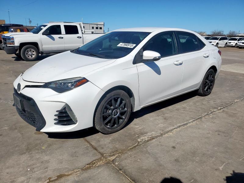 TOYOTA COROLLA L 2018 with VIN 5YFBURHE2JP738892 - Photo from auction