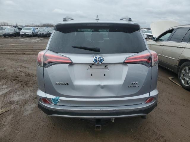 Photo 6 from auction – 2017 TOYOTA RAV4 HV LE with VIN JTMRJREV2HD080693