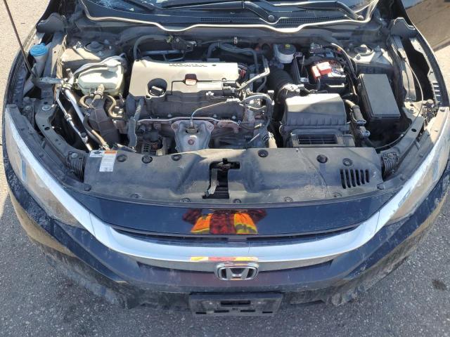 Photo 11 from auction – 2018 HONDA CIVIC LX with VIN 19XFC2F51JE038992