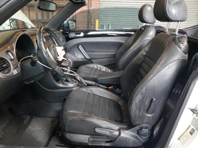 Photo 7 from auction – 2014 VOLKSWAGEN BEETLE with VIN 3VW5L7AT8EM817815