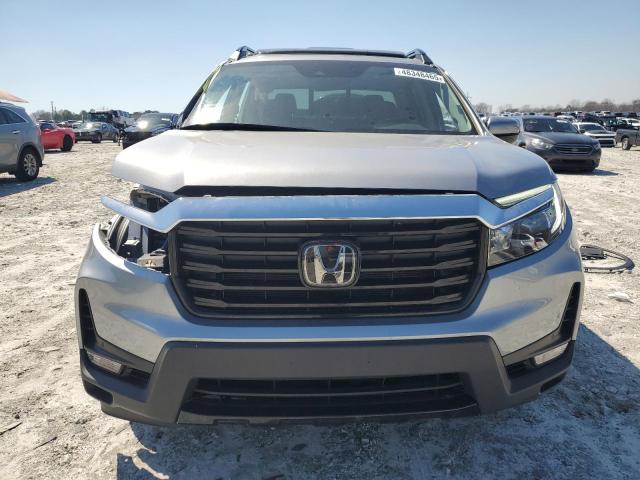 Photo 5 from auction – 2023 HONDA RIDGELINE with VIN 5FPYK3F75PB020413