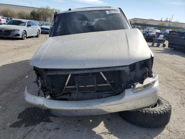 Photo 5 from auction – 2004 GMC YUKON with VIN 1GKEC13Z84J297911
