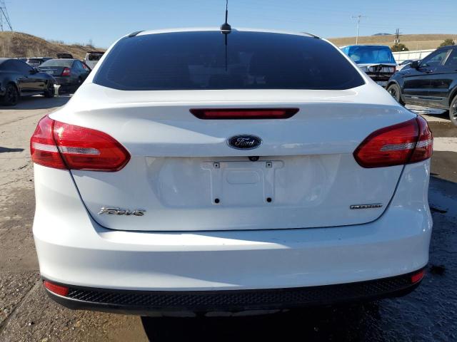 Photo 6 from auction – 2016 FORD FOCUS S with VIN 1FADP3E21GL310553