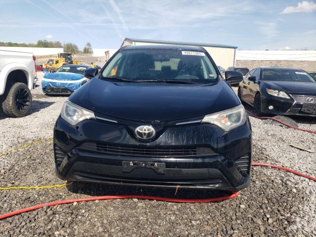 Photo 5 from auction – 2018 TOYOTA RAV4 LE with VIN 2T3BFREV8JW777586