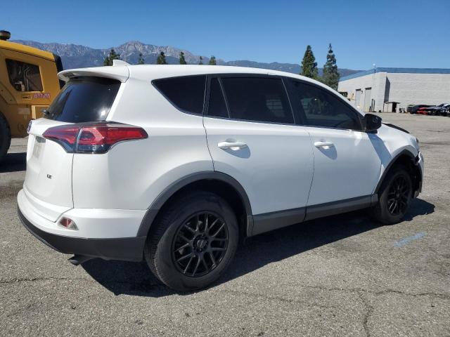 Photo 3 from auction – 2018 TOYOTA RAV4 LE with VIN 2T3ZFREV2JW460627