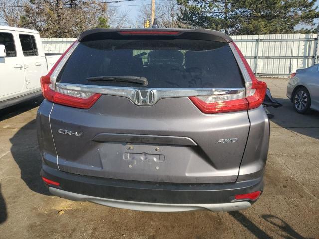 Photo 6 from auction – 2017 HONDA CR-V with VIN 5J6RW2H83HL065439