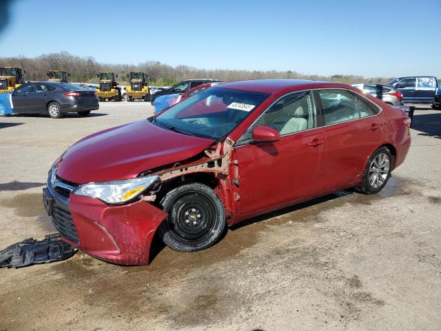 TOYOTA CAMRY HYBR 2016 with VIN 4T1BD1FK4GU193327 - Photo from auction