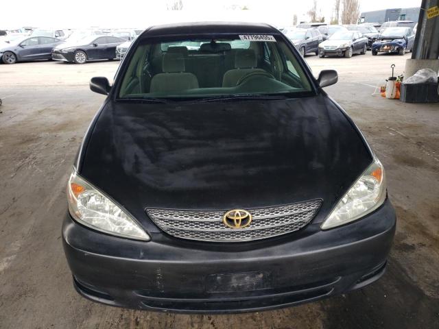 Photo 5 from auction – 2002 TOYOTA CAMRY LE with VIN JTDBE30K920047754