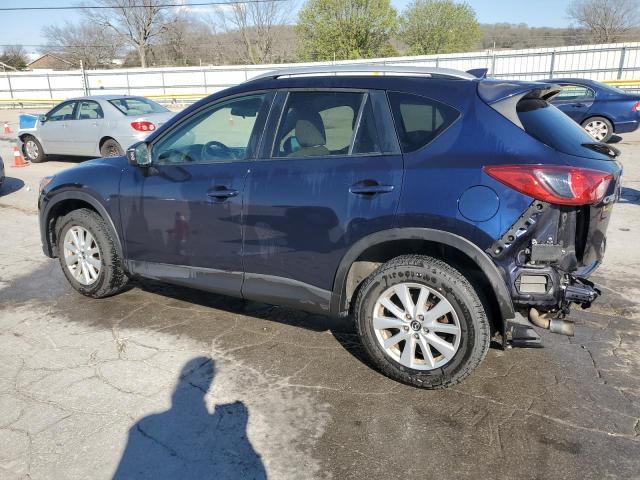 Photo 2 from auction – 2014 MAZDA CX-5 TOURI with VIN JM3KE2CY9E0338230