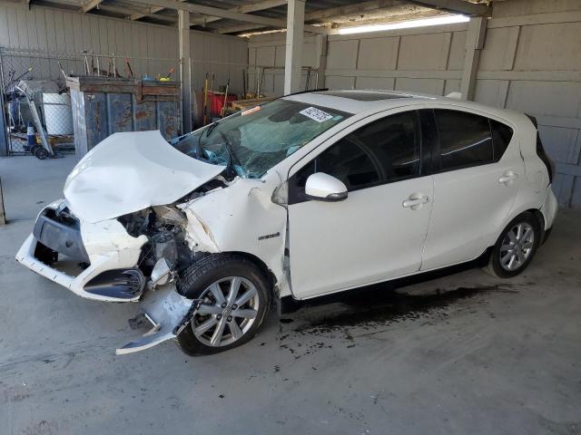 TOYOTA PRIUS C 2017 with VIN JTDKDTB33H1592702 - Photo from auction