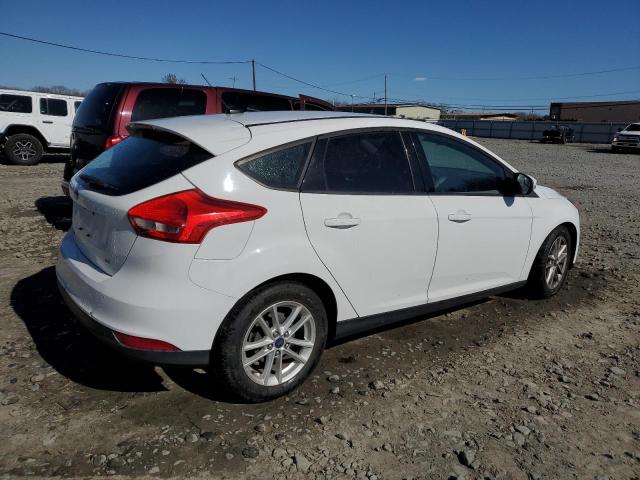 Photo 3 from auction – 2015 FORD FOCUS SE with VIN 1FADP3K22FL283740